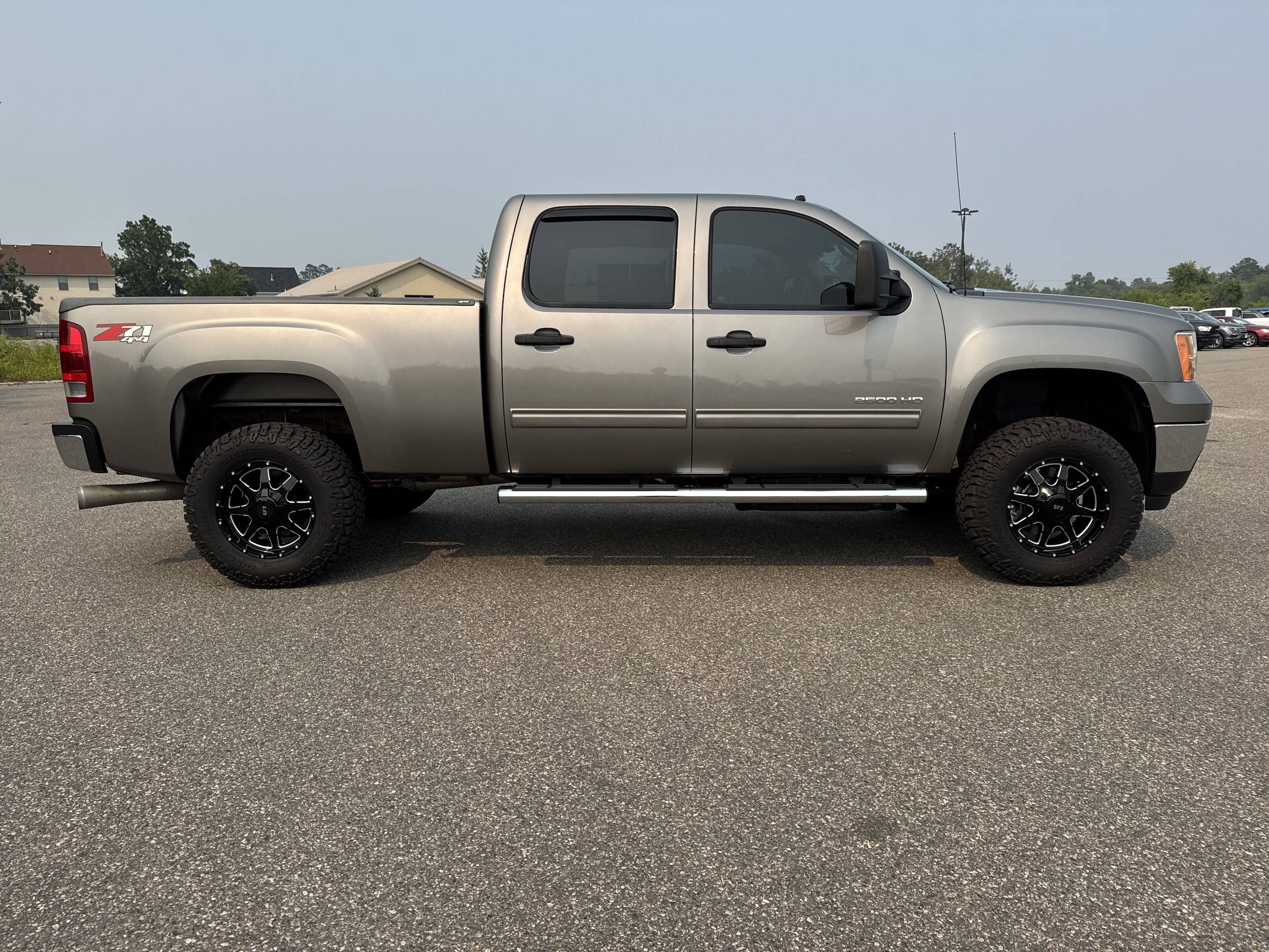 Used 2012 GMC Sierra 2500HD SLE with VIN 1GT120C84CF153532 for sale in Bemidji, Minnesota