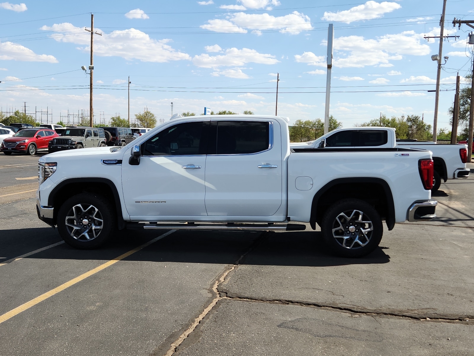 Used 2023 GMC Sierra 1500 SLT with VIN 3GTUUDE84PG266378 for sale in Clovis, NM