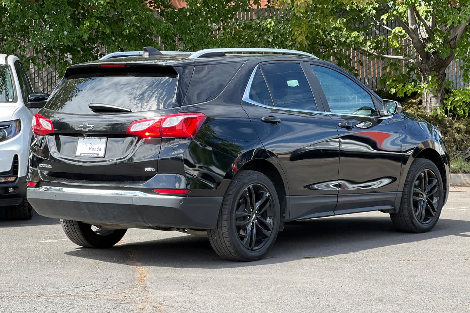 Used 2021 Chevrolet Equinox LT with VIN 3GNAXUEV0ML400426 for sale in Bend, OR