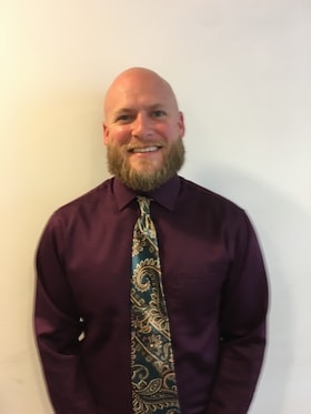 Staff member Adam Crowe from 8887d6d39d39