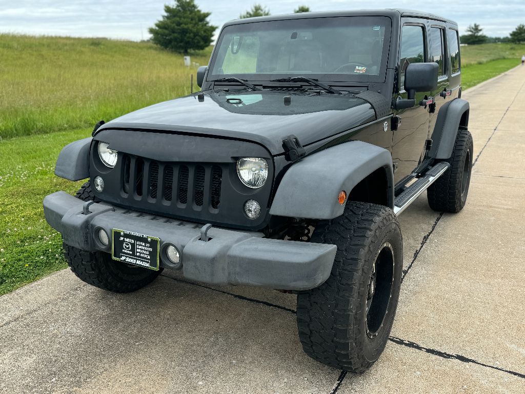 Used 2014 Jeep Wrangler Unlimited Sport with VIN 1C4BJWDG0EL139521 for sale in Cape Girardeau, MO