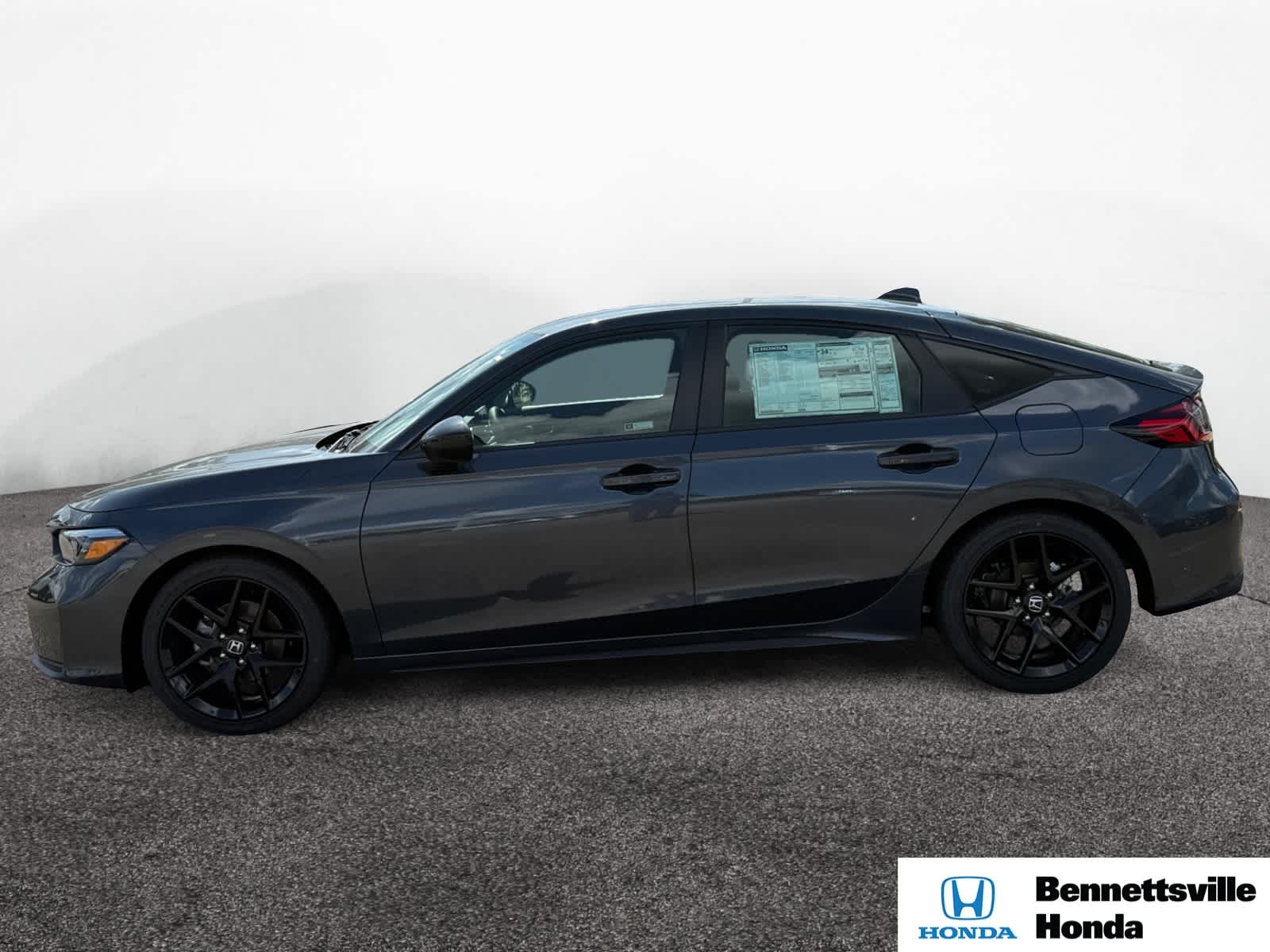 2025 Honda Civic Hatchback Sport photo 2