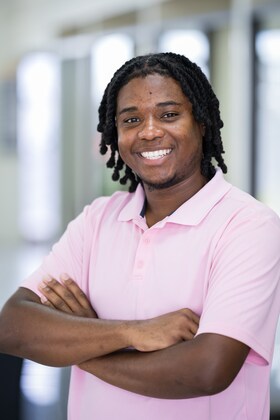 Staff member Cornelius Hill from ID_73a6d4fd0ec3