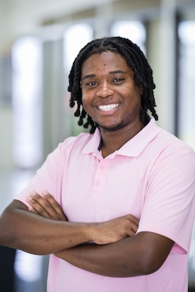 Staff member Cornelius Hill from ID_73a6d4fd0ec3