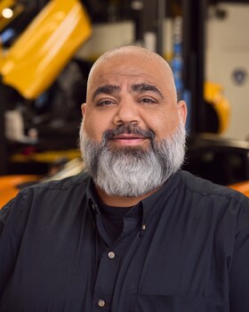 Staff member Alex Astar from 90469e0c687e