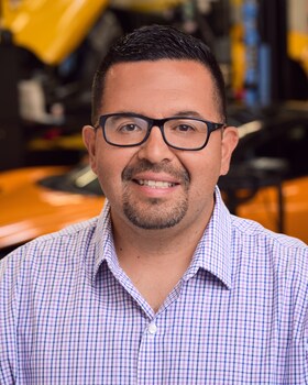 Staff member Wally Mena from 90469e0c687e