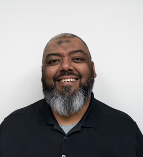 Staff member Aamer Ali from ID_d9312c