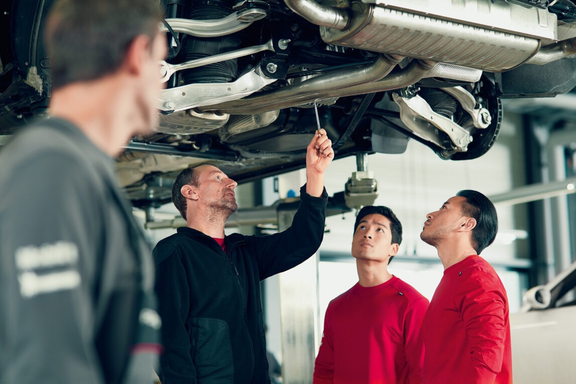 porsche-service-under-car-dudes.jpg