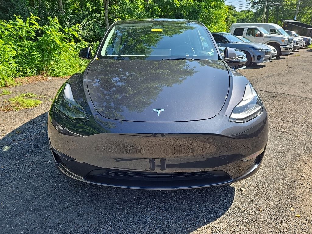 Used 2025 Tesla Model Y Long Range with VIN 7SAYGDEE6SF233785 for sale in Spring House, PA