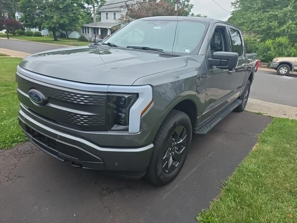 Certified 2023 Ford F-150 Lightning XLT with VIN 1FT6W1EV9PWG35499 for sale in Spring House, PA