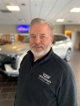 Staff member Christopher P. Denight from ID_5ec323