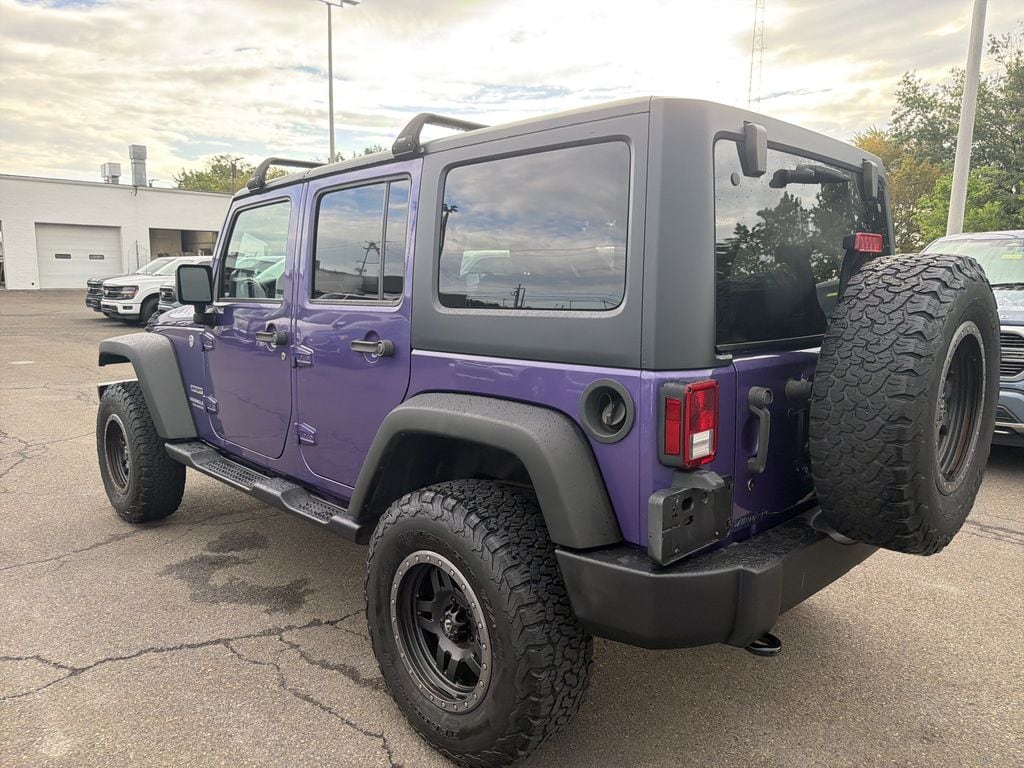 Used 2017 Jeep Wrangler Unlimited 3.6L 4WD Sport Soft Top w/ Satellite Radio SUV