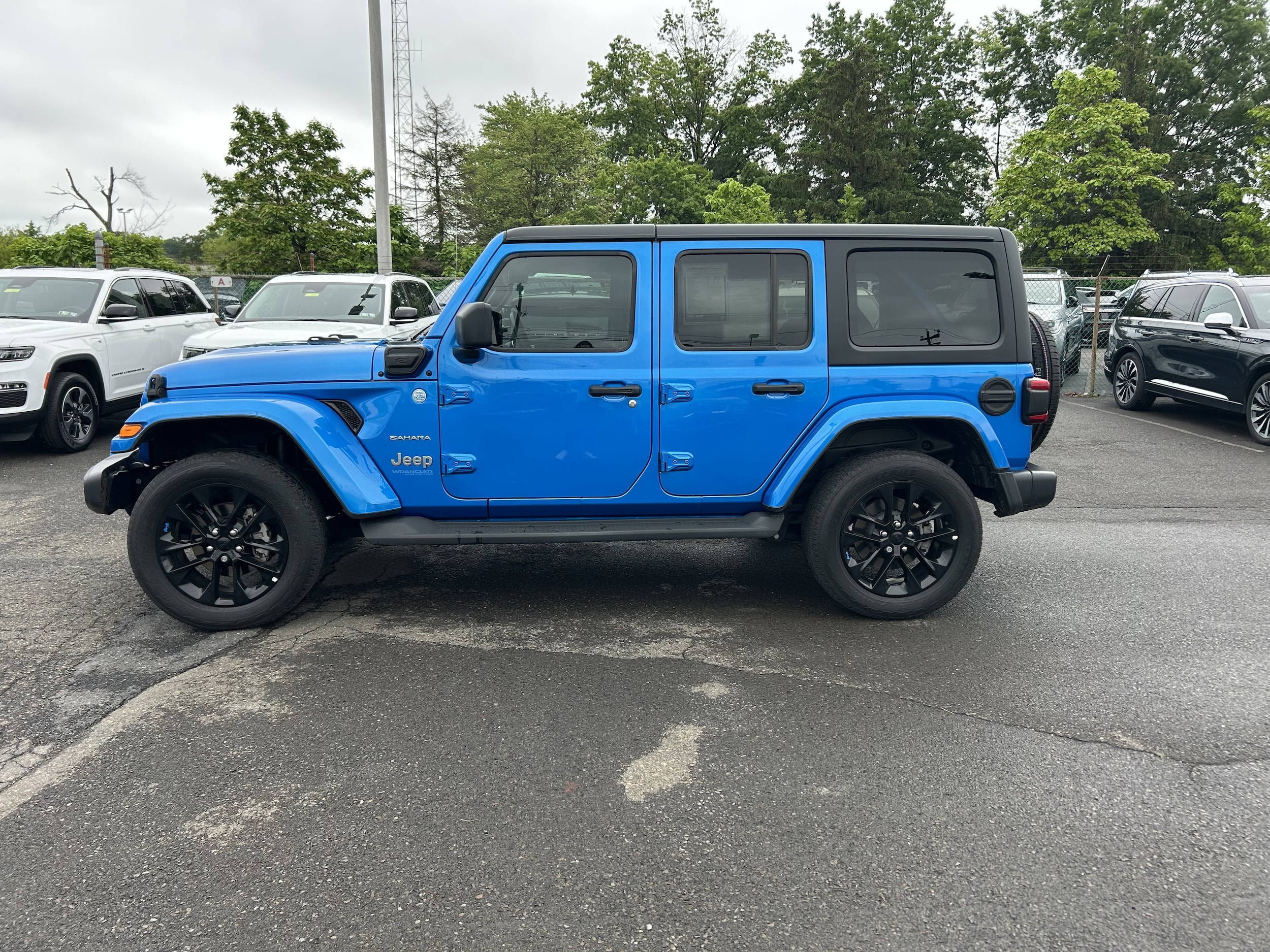 Used 2022 Jeep Wrangler Unlimited Sahara 4XE with VIN 1C4JJXP64NW170435 for sale in Lansdale, PA