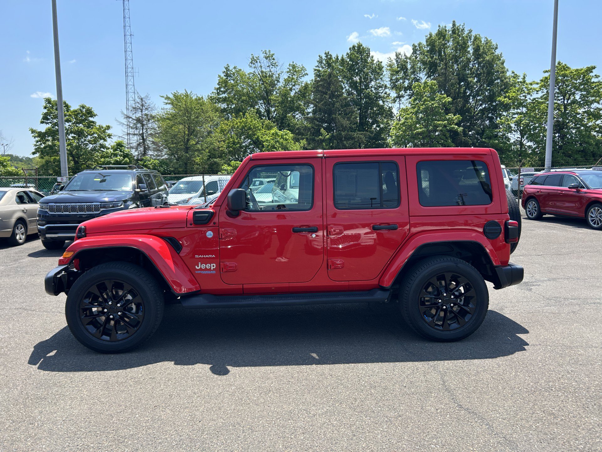 Used 2022 Jeep Wrangler Unlimited Sahara 4XE with VIN 1C4JJXP6XNW232629 for sale in Lansdale, PA