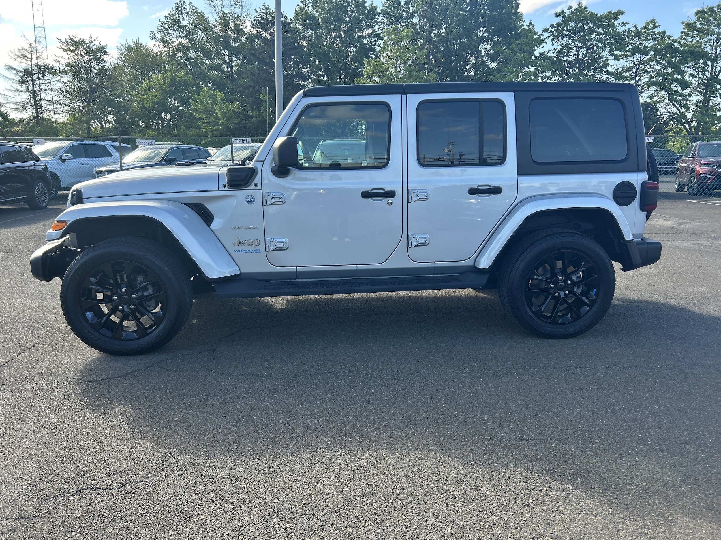 Used 2022 Jeep Wrangler Unlimited Sahara 4XE with VIN 1C4JJXP66NW216153 for sale in Lansdale, PA