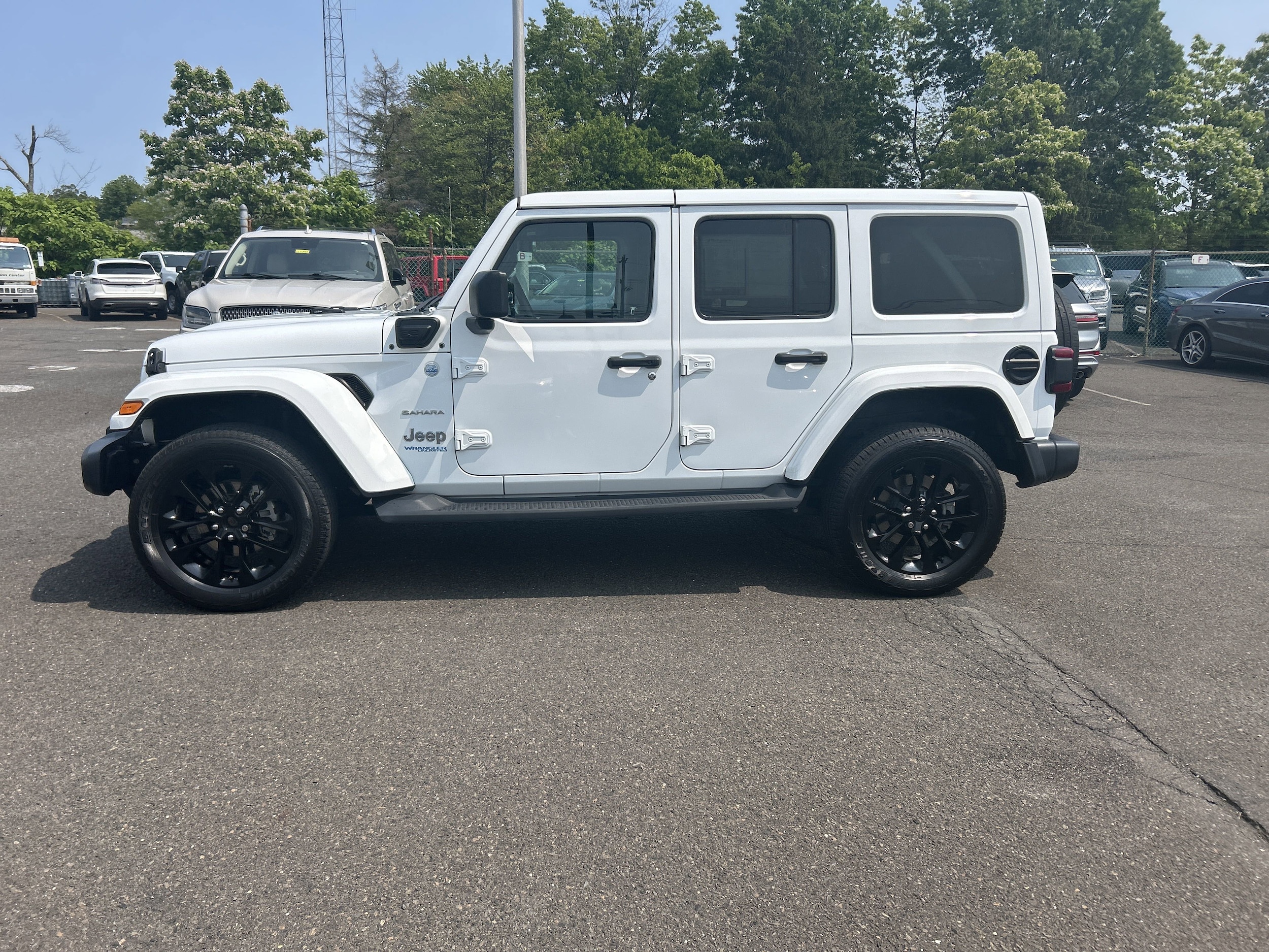 Used 2021 Jeep Wrangler Unlimited Sahara 4XE with VIN 1C4JJXP61MW724206 for sale in Lansdale, PA
