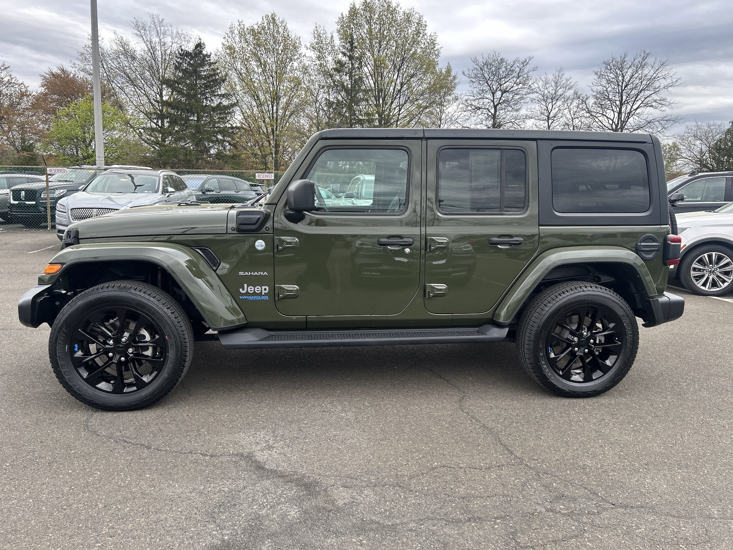 Used 2022 Jeep Wrangler Unlimited Sahara 4XE with VIN 1C4JJXP67NW228652 for sale in Lansdale, PA