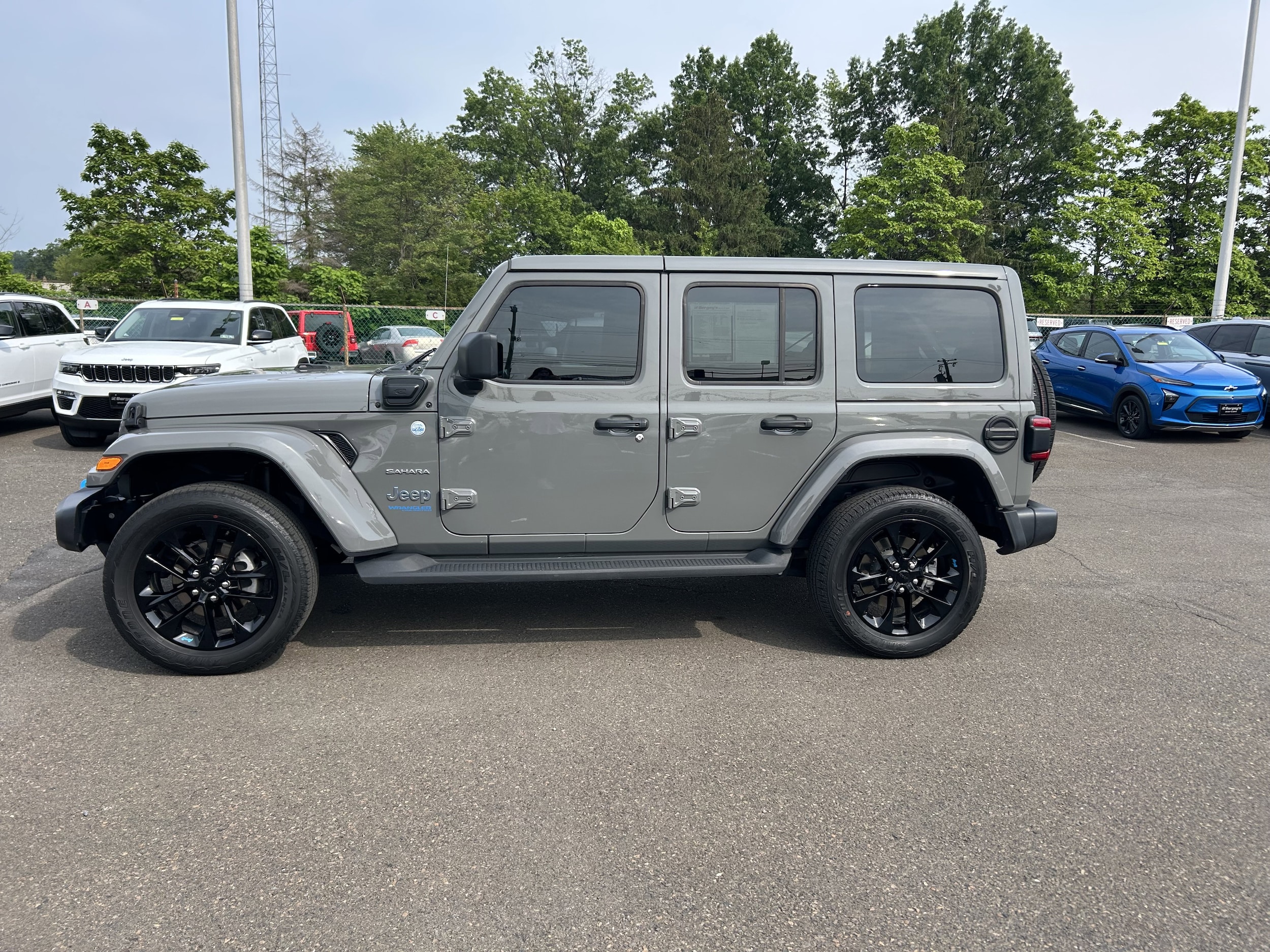 Used 2022 Jeep Wrangler Unlimited Sahara 4XE with VIN 1C4JJXP6XNW238916 for sale in Lansdale, PA