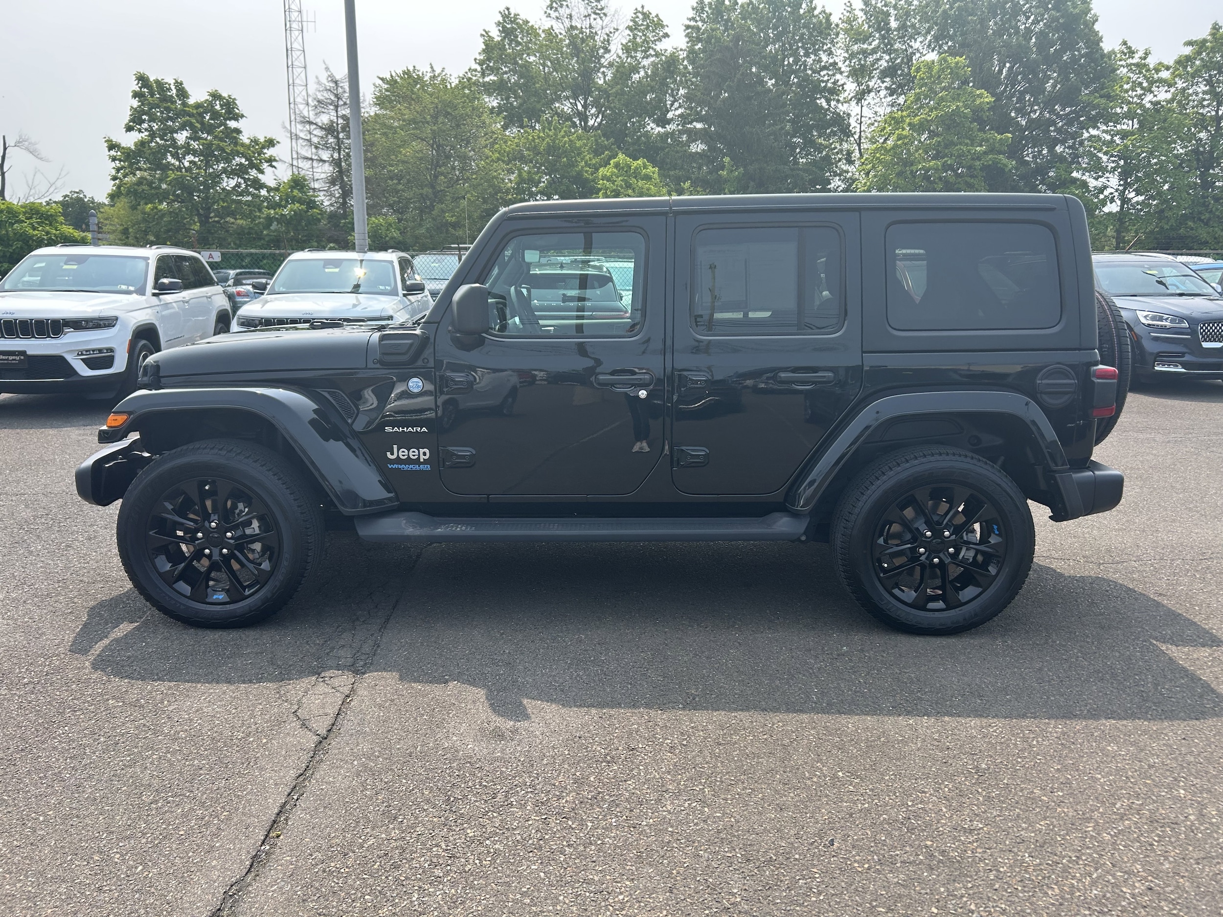 Used 2022 Jeep Wrangler Unlimited Sahara 4XE with VIN 1C4JJXP64NW250074 for sale in Lansdale, PA