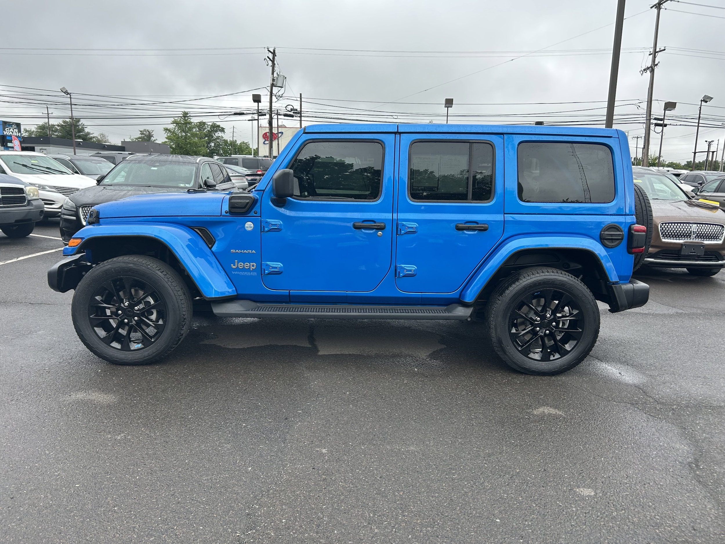 Used 2022 Jeep Wrangler Unlimited Sahara 4XE with VIN 1C4JJXP62NW267794 for sale in Lansdale, PA