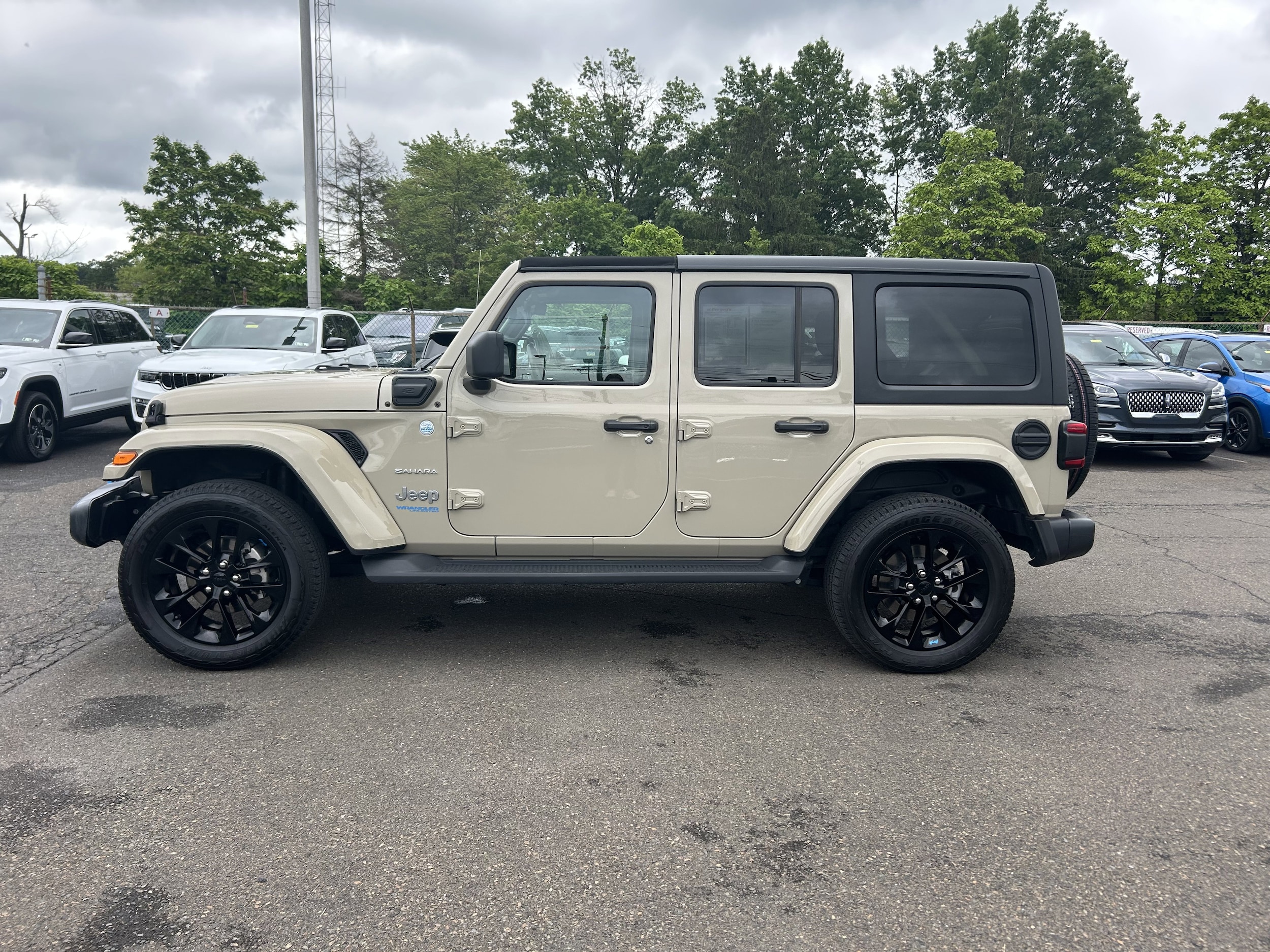 Used 2022 Jeep Wrangler Unlimited Sahara 4XE with VIN 1C4JJXP60NW257782 for sale in Lansdale, PA