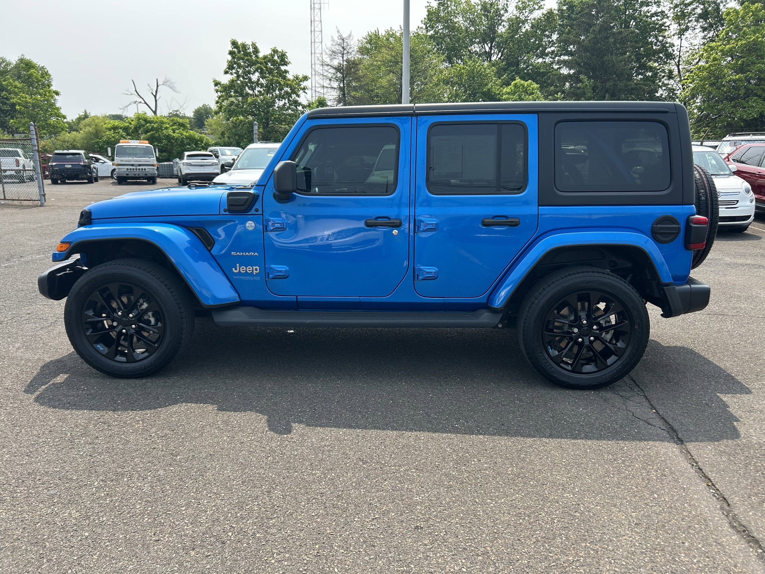 Used 2022 Jeep Wrangler Unlimited Sahara 4XE with VIN 1C4JJXP69NW275195 for sale in Lansdale, PA
