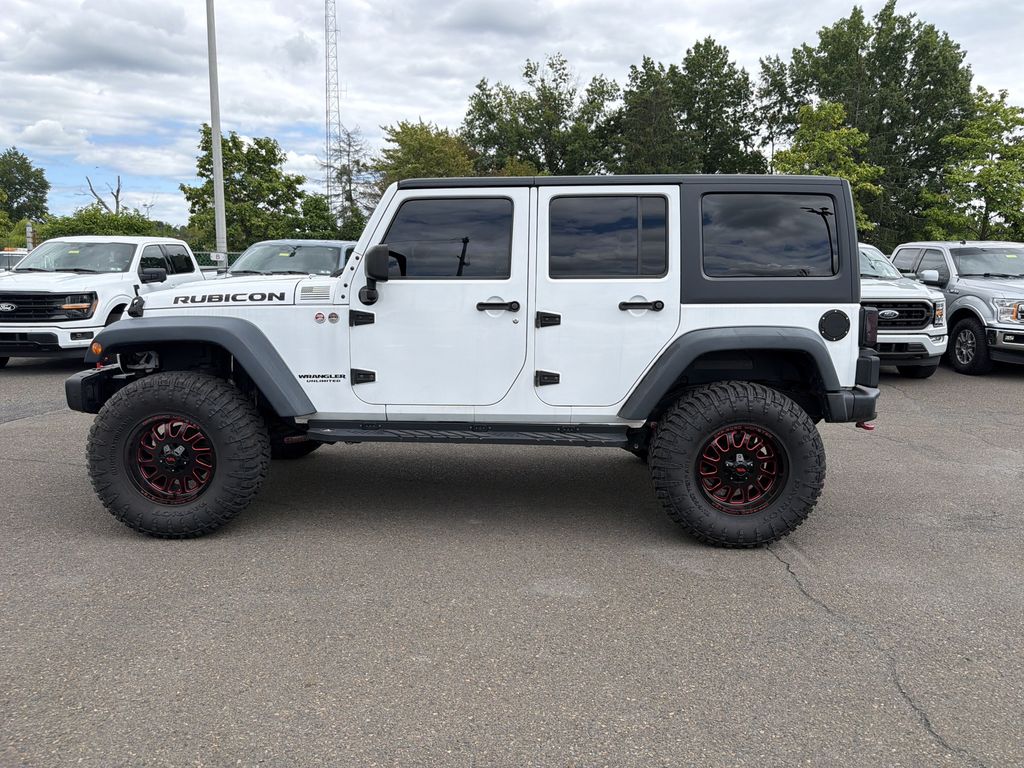 Used 2015 Jeep Wrangler Unlimited Rubicon with VIN 1C4HJWFG2FL774569 for sale in Lansdale, PA