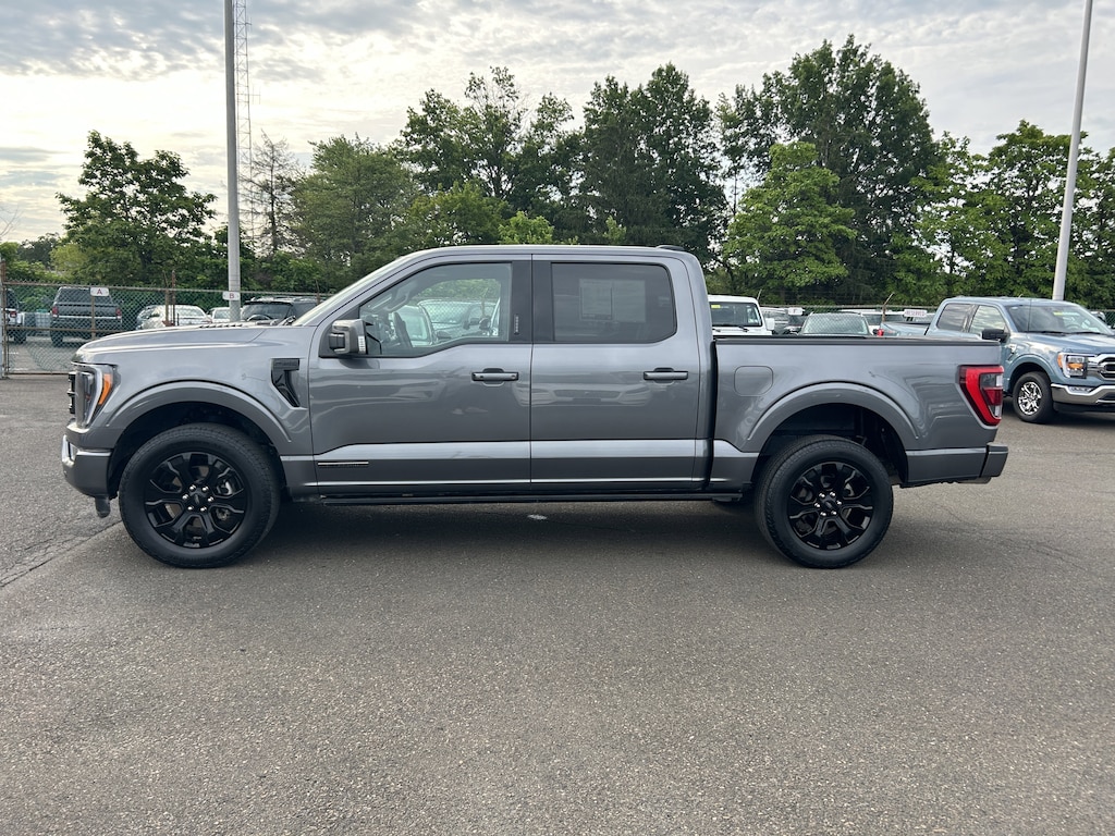 Used 2023 Ford F-150 3.5L 4WD Lariat PowerBoost w/ Black Appearance & Sport Pkg Truck SuperCrew Cab
