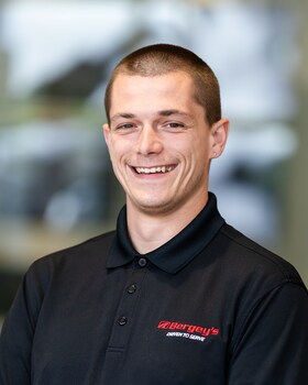 Staff member JUSTIN BENNETT from 490a7934d981