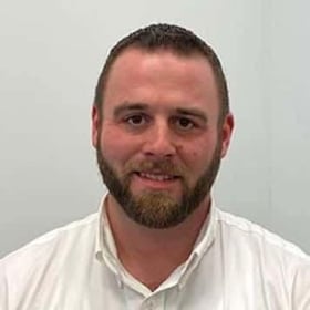 Staff member John Artusio from 3a6899f968e4