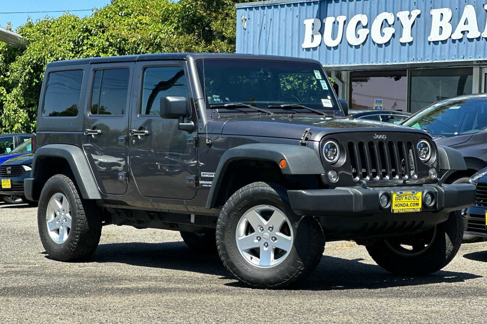 Used 2014 Jeep Wrangler Unlimited Sport with VIN 1C4HJWDG3EL227764 for sale in Berkeley, CA