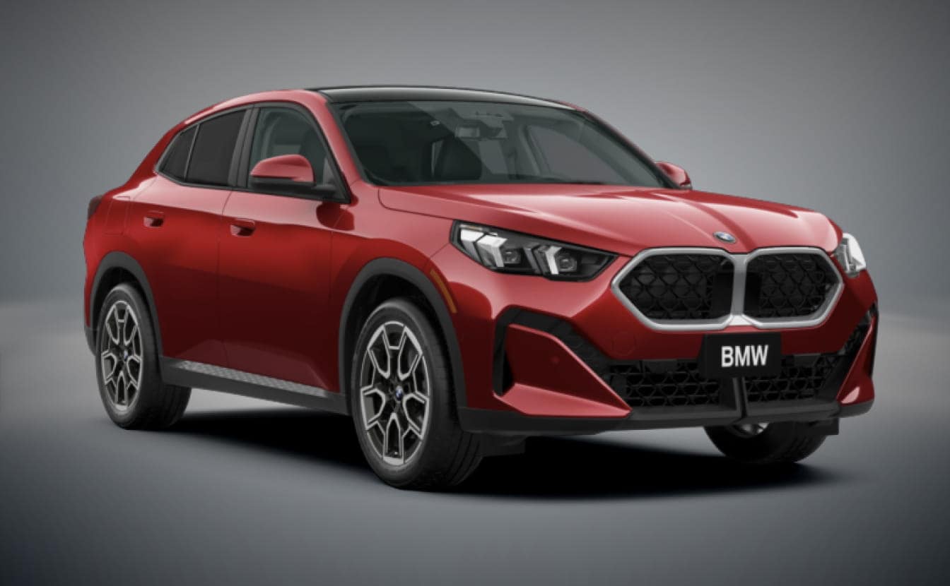 A red BMW X2 SUV shown from a front three-quarter angle against a neutral gray studio background.