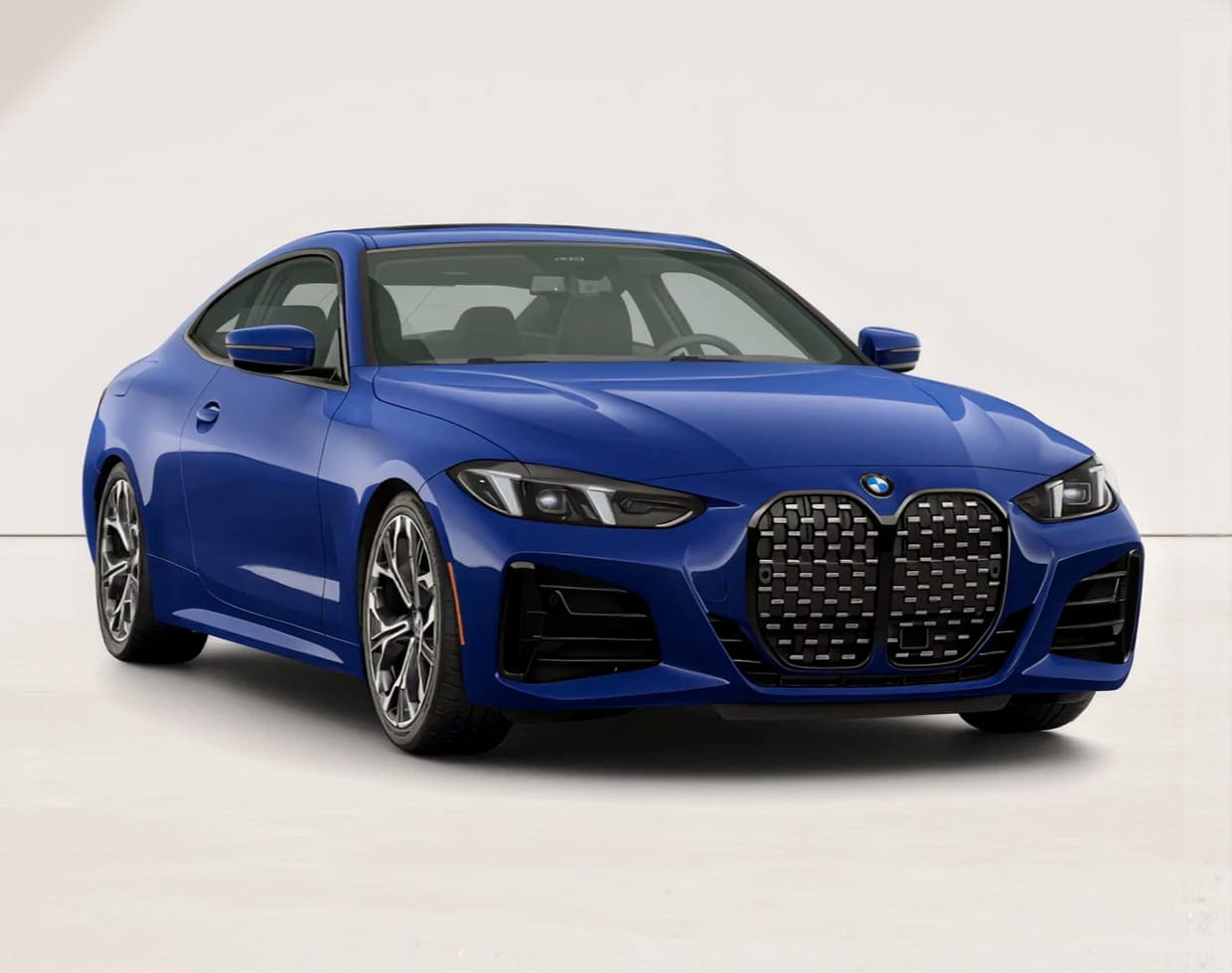 Blue BMW 430i Coupe shown from a front three-quarter angle.