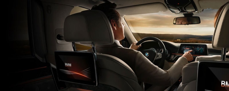 Driver Using BMW ConnectedDrive