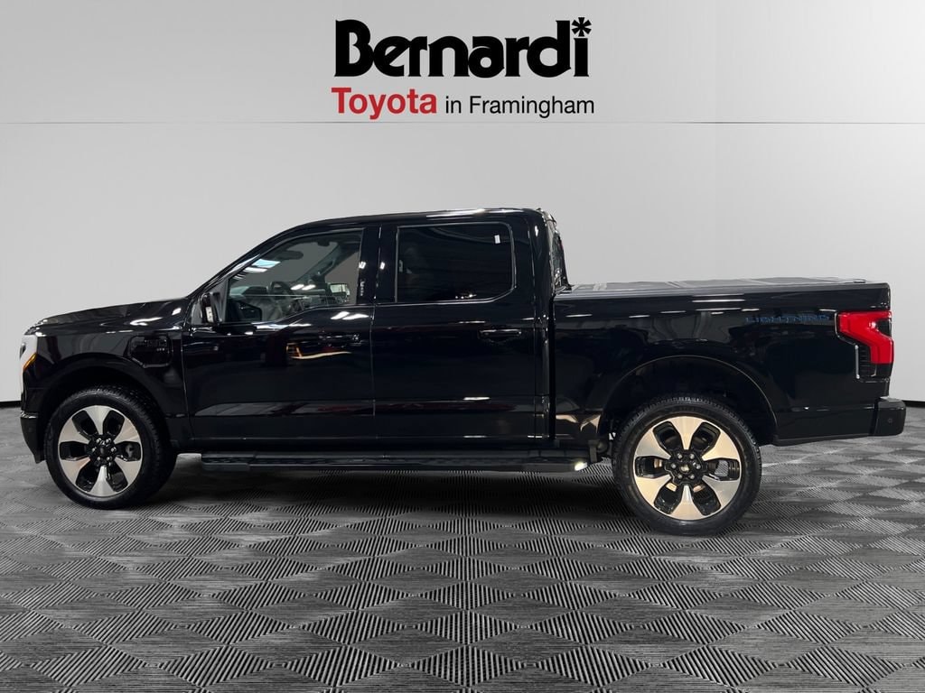 Used 2022 Ford F-150 Lightning Platinum with VIN 1FT6W1EV1NWG09007 for sale in Framingham, MA