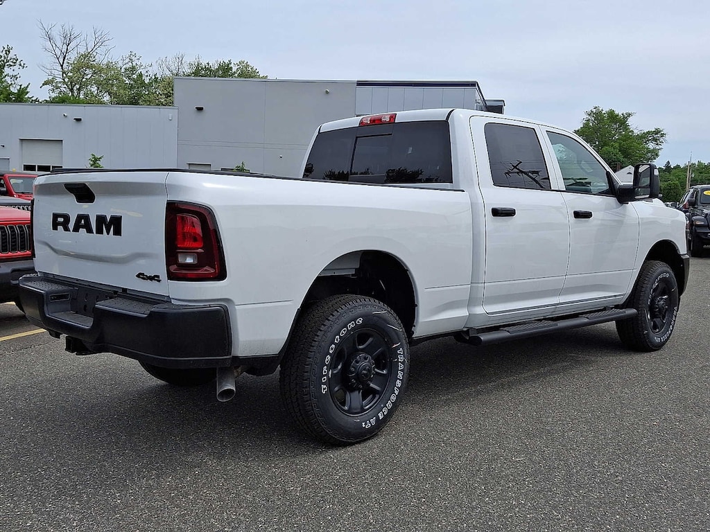 New 2026 Ram 3500 TRADESMAN CREW CAB 4X4 6'4 BOX Pickup
