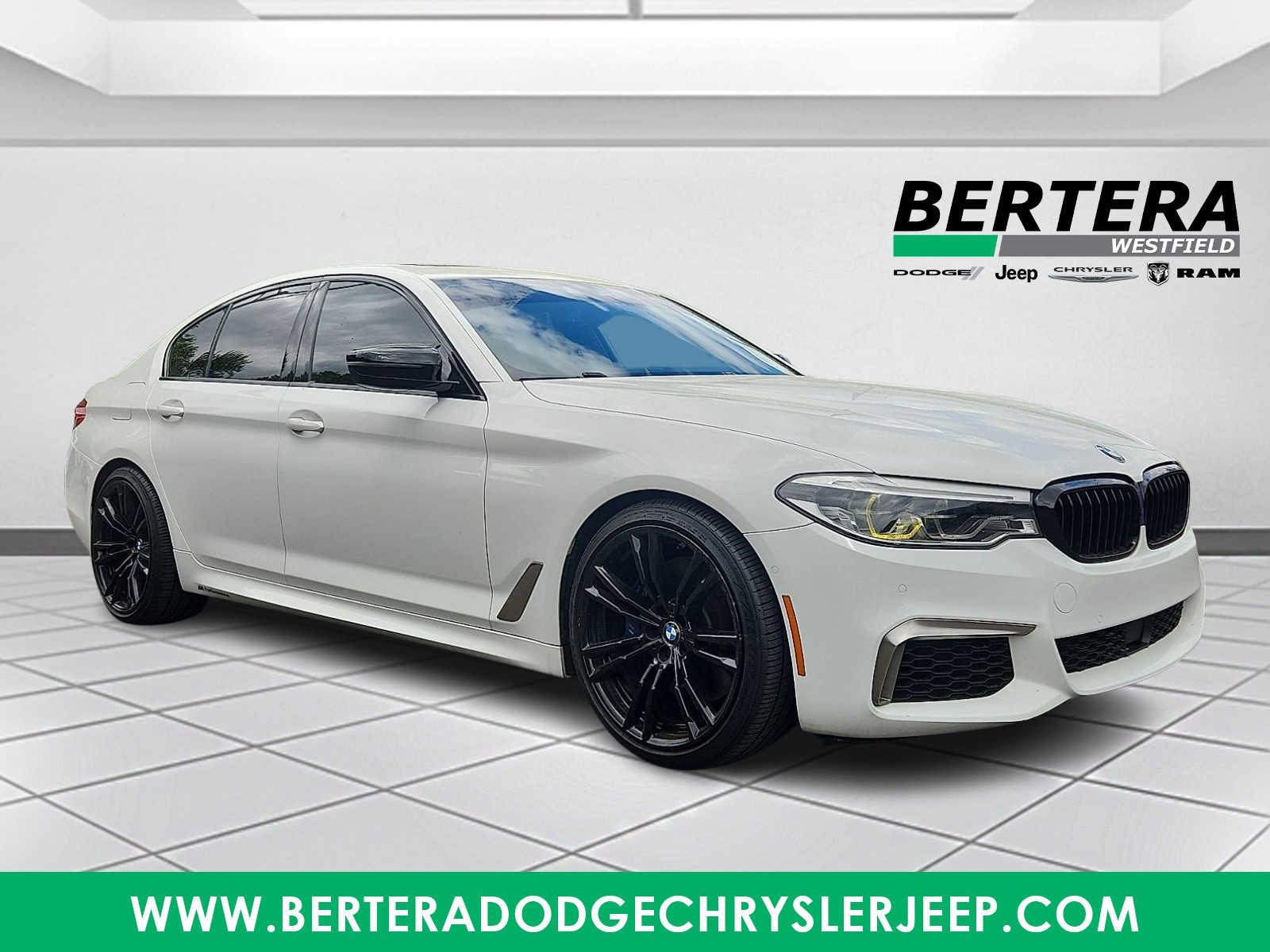2020 BMW 5 Series M550i xDrive Sedan's photo
