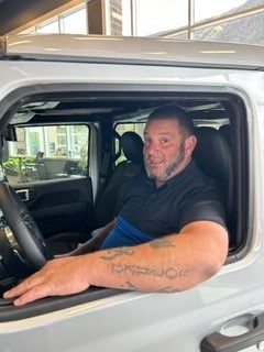 Staff member Charlie Taylor from 5e00b79d9e28