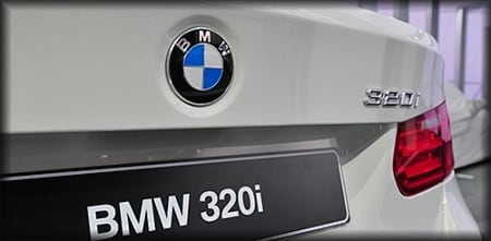 BMW 320i grey rear view photo