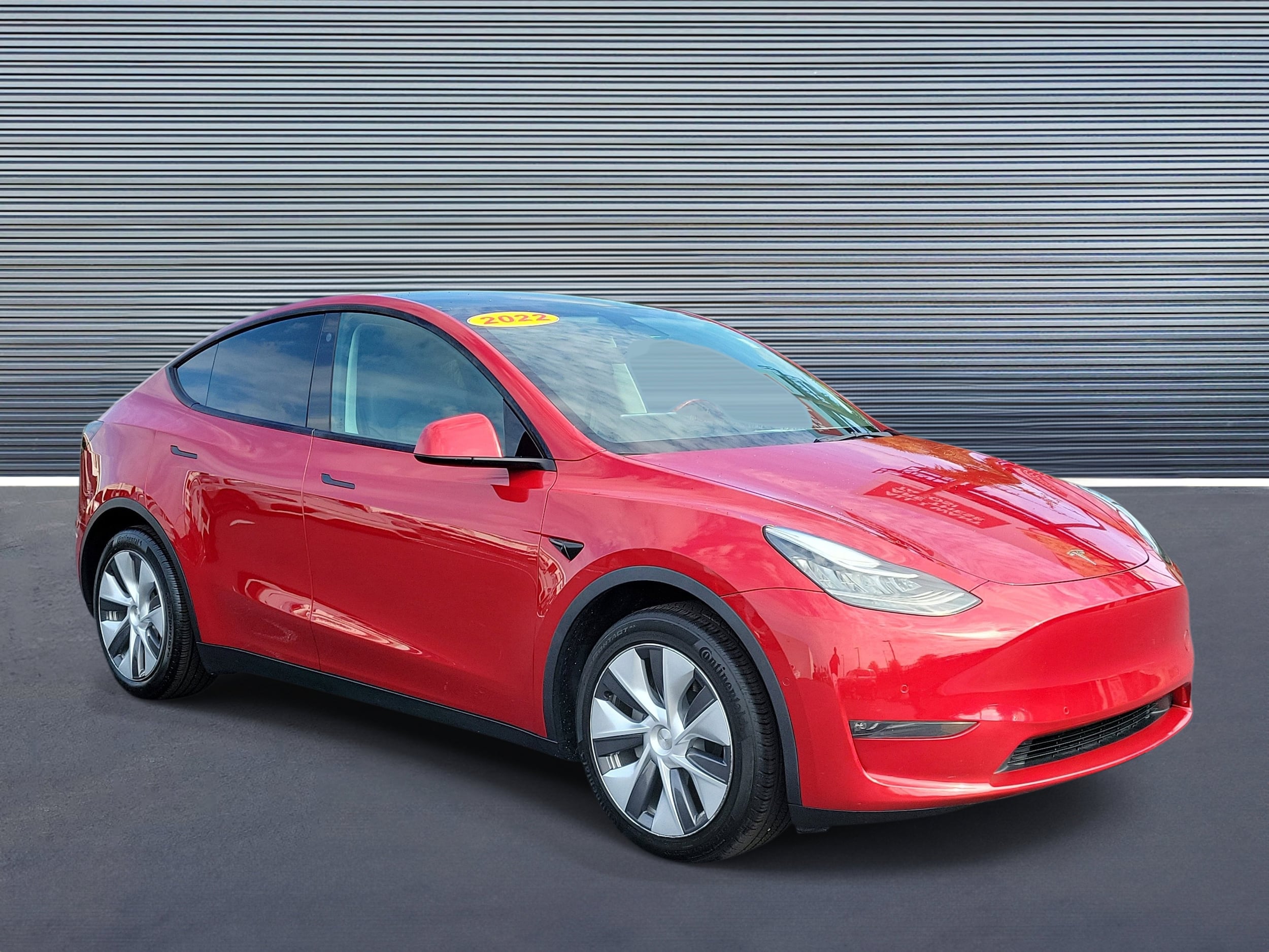 Used 2022 Tesla Model Y Long Range with VIN 7SAYGDEE7NA021091 for sale in St. Petersburg, FL