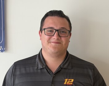 Staff member Andrew Grove from ID_9ee9e9