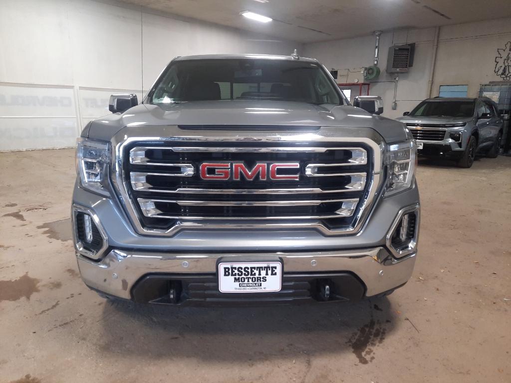 Used 2021 GMC Sierra 1500 SLT with VIN 3GTU9DED7MG121734 for sale in Minot, ND