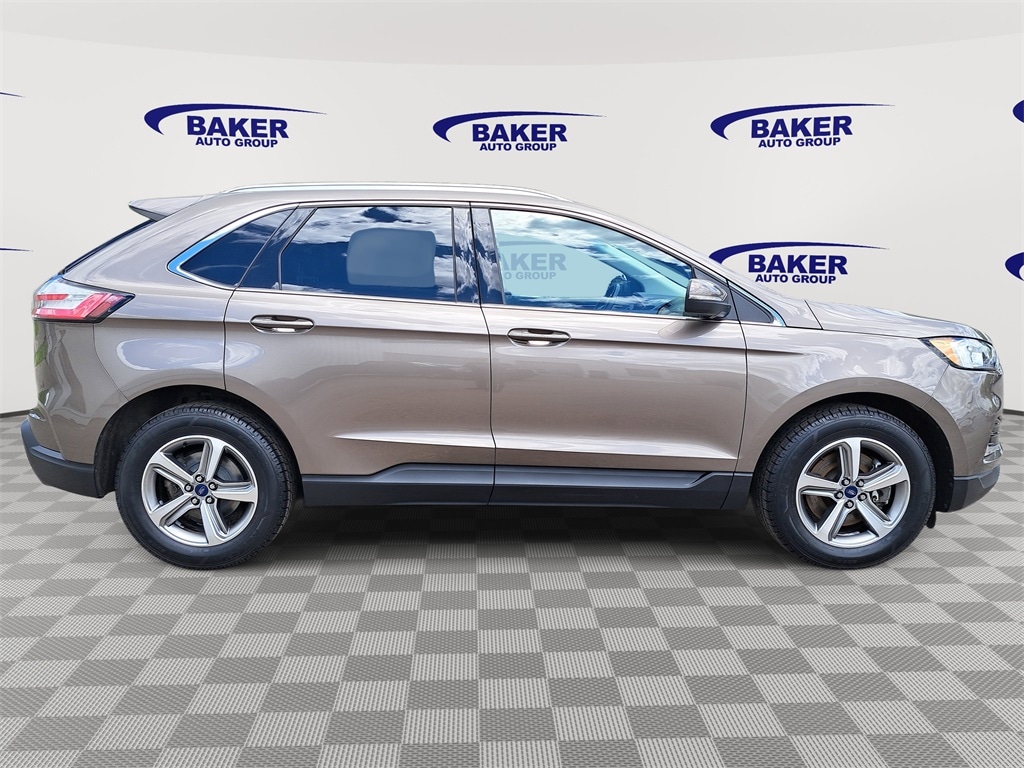 Used 2019 Ford Edge SEL with VIN 2FMPK4J98KBB09400 for sale in Lowell, MI