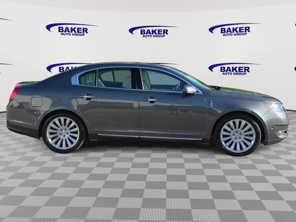 Used 2015 Lincoln MKS Base with VIN 1LNHL9EK3FG600225 for sale in Lowell, MI