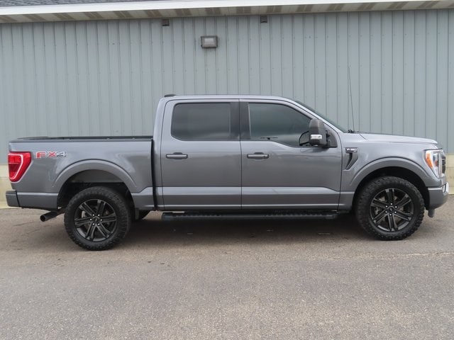 Used 2021 Ford F-150 XLT with VIN 1FTFW1E80MKE09025 for sale in Cadillac, MI