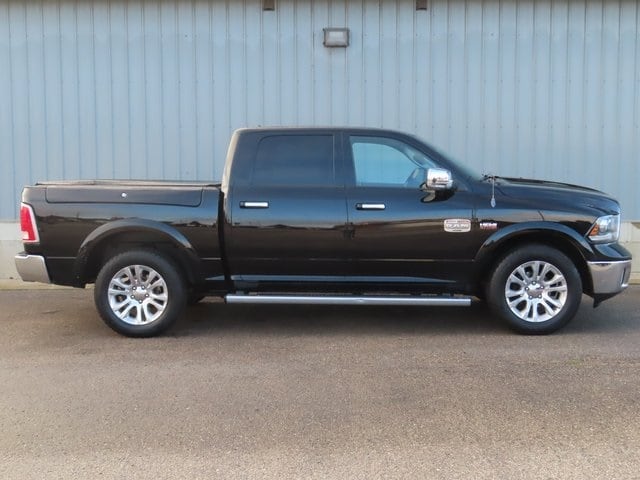 Used 2013 RAM Ram 1500 Pickup Laramie Longhorn with VIN 1C6RR7PTXDS607725 for sale in Cadillac, MI