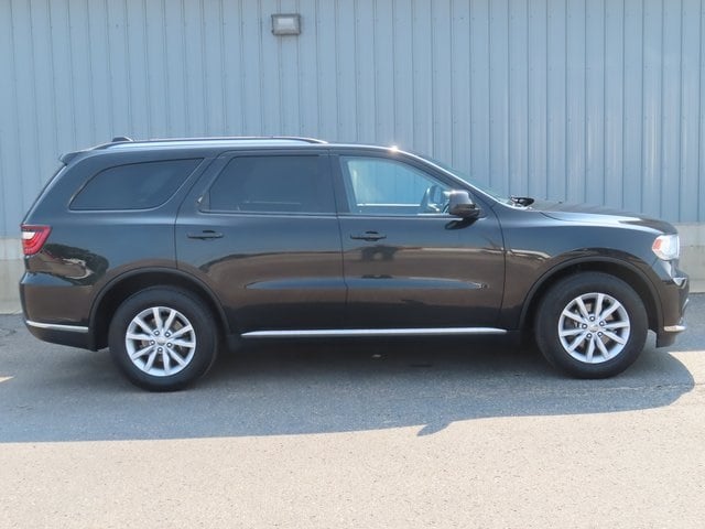 Used 2014 Dodge Durango SXT with VIN 1C4RDJAG0EC514479 for sale in Cadillac, MI