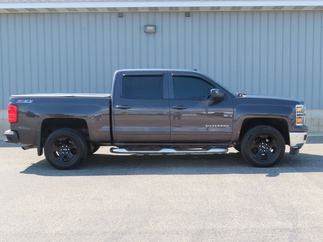 Used 2015 Chevrolet Silverado 1500 LT with VIN 3GCUKREC0FG335220 for sale in Cadillac, MI