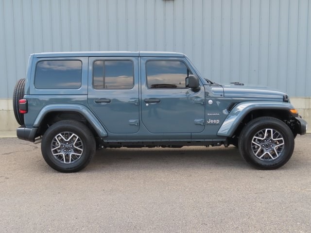 Used 2024 Jeep Wrangler 4-Door Sahara with VIN 1C4PJXEG6RW246796 for sale in Cadillac, MI