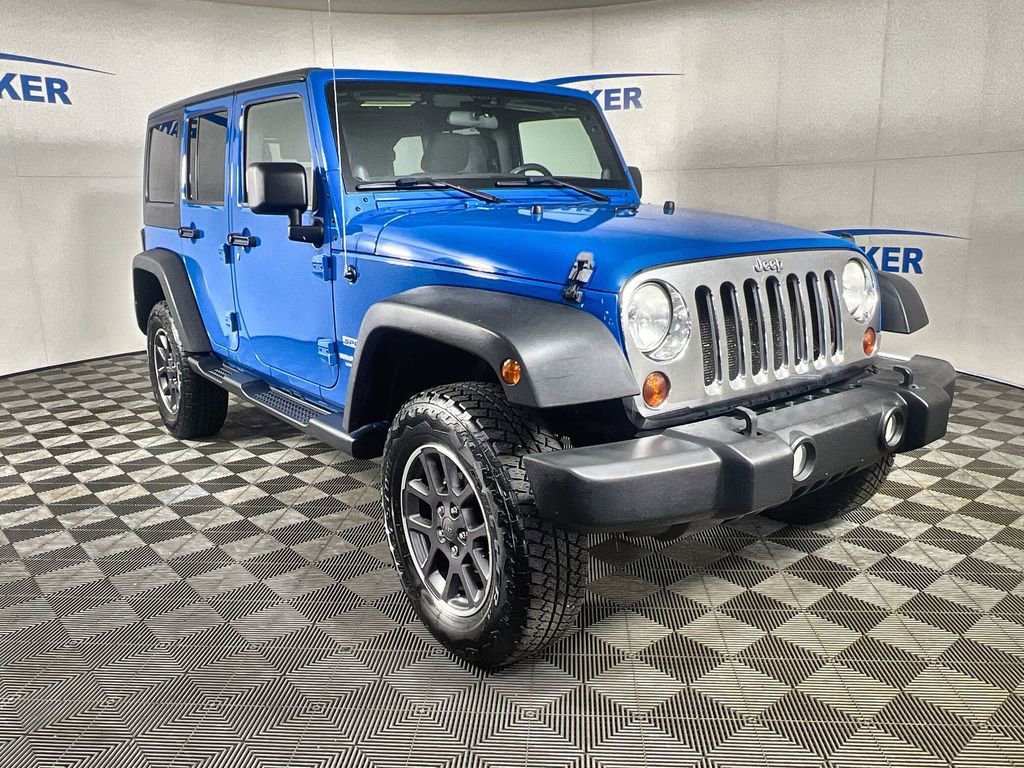 Used 2011 Jeep Wrangler Unlimited Sport with VIN 1J4BA3H18BL532077 for sale in Coopersville, MI